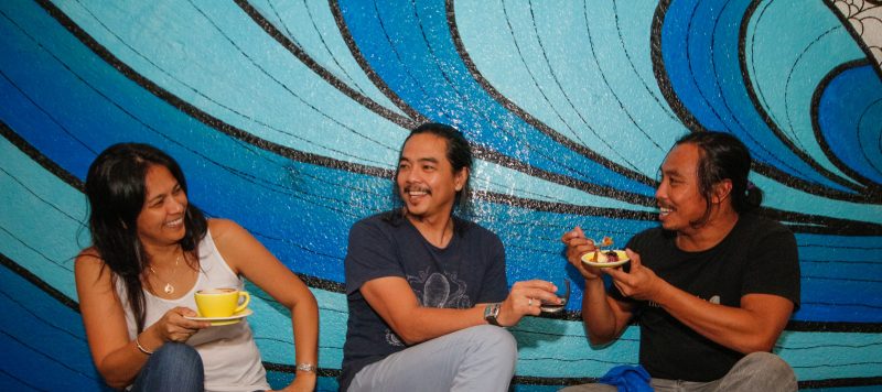 From left: Cafe L'Usine owners Revic and Ruel Rodrigo with surfer-chef Marco Villareal